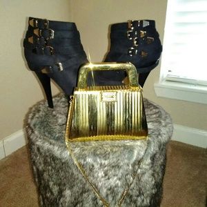 Black and gold platform heels with Gold cluth